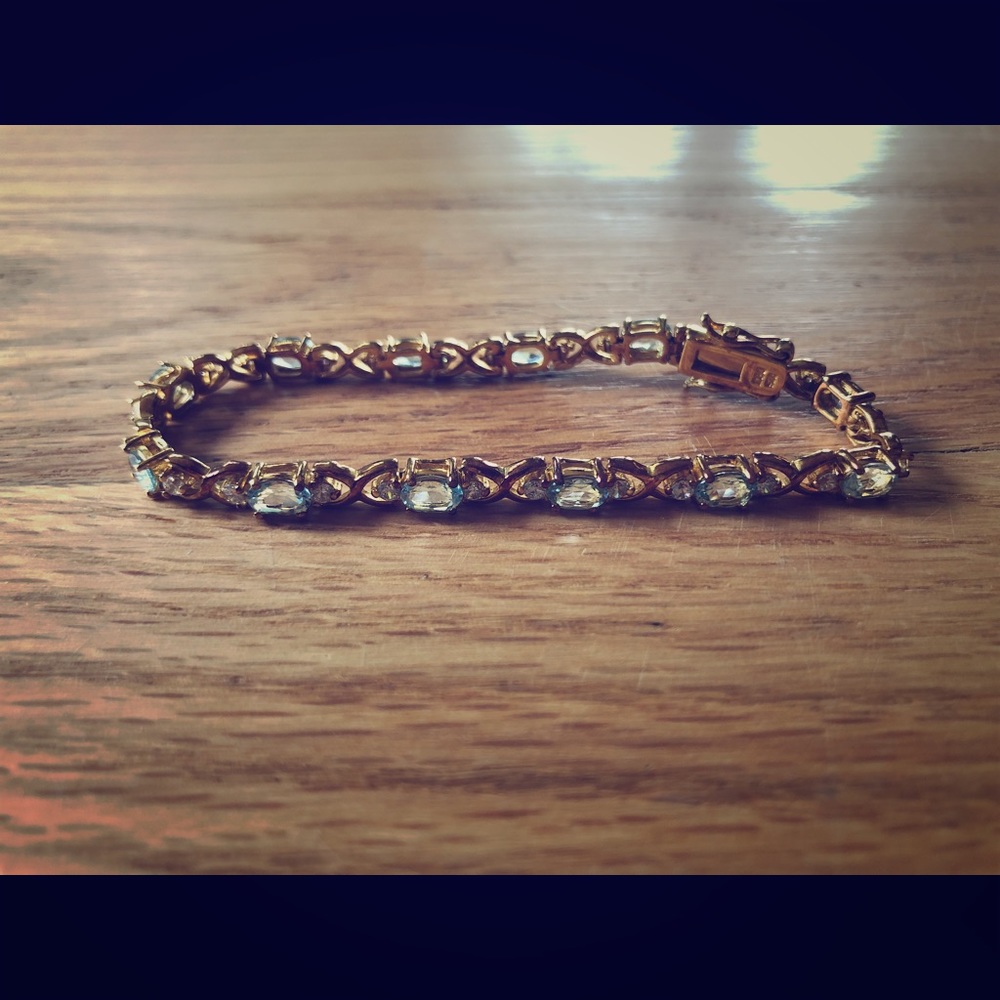 Blue Topaz and Diamond Accent Gold Plated Bracelet